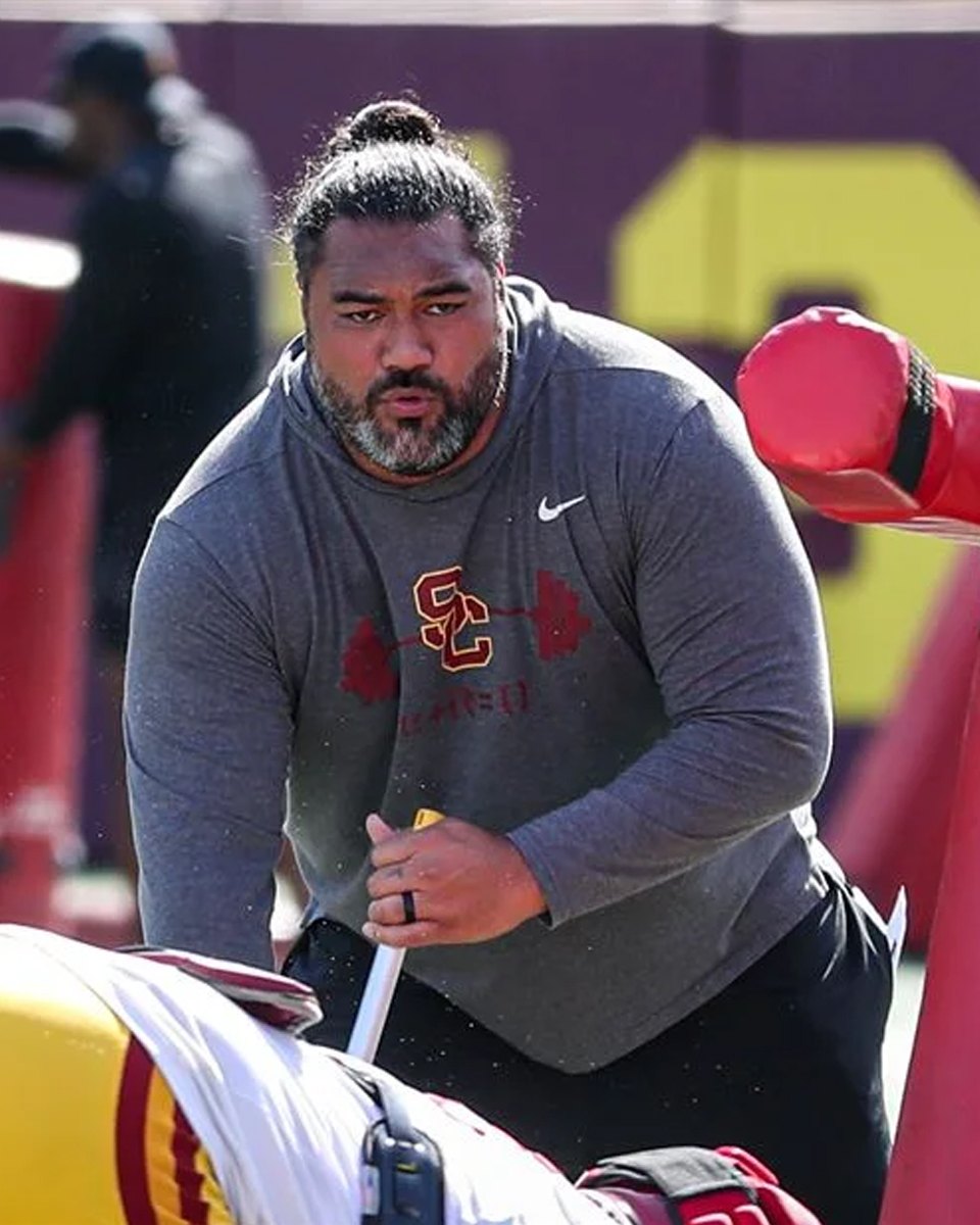 College football coach at practice